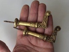 Paire de crochets pour embrasses de rideau laiton à visser longueur 7,4 cm C1