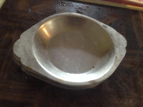 Eight small stainless steel