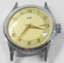 RARE MONTRE LIP SPECIALE R.25 GUICHET ROUGE ET BLANC EN TRIANGLE