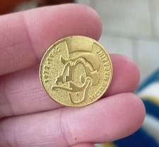 Pin's VINTAGE Picsou magazine doré façon pièce