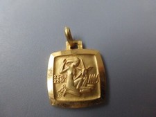 médaille neuve signe la