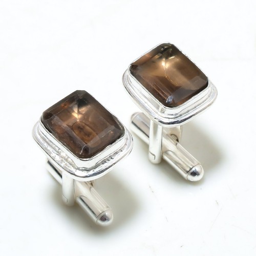 Boutons manchette faits - de,