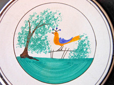 Dessous de plat rare faience de Forges les Eaux " Oiseau perché a la barrière "