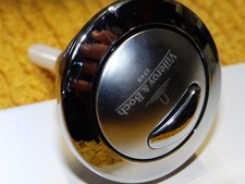 Bouton de chasse réservoir