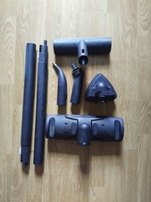 Accessoires pour nettoyeur vapeur Dupray.  Une raclette à vitres, une brosse ave