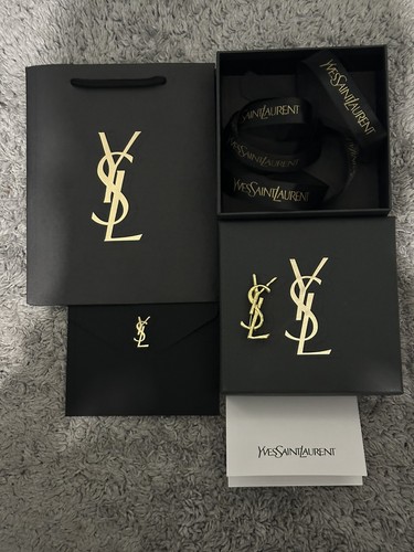 Broche yves saint laurent - yves,