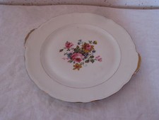 Ancien Plat rond en porcelaine