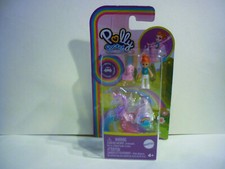 polly pocket poupée avec son anImal et un véhicule métal neuf jamais déballé