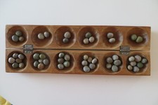 Jeu africain AWELE ou AWALE en bois avec règle du jeu