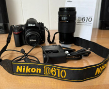 nikon D 610 (full frame) + 50 mm + 35-135 mm l'ensemble ayant très peu servi