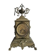 Pendule ancienne bronze doré, mascaron et pieds griffes, époque XIXème, horloge 