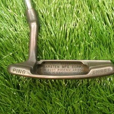 Putter ancien finition cuivre