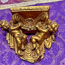 petite console murale a decor d angelots anges cherubins en stuc doré epok 1980