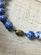 Collier perles de porcelaine
