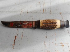 couteau allemand Hubertus Solingen,lame gravée cours de La Moselle bon etat