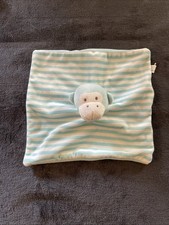 Doudou plat singe rayé vert