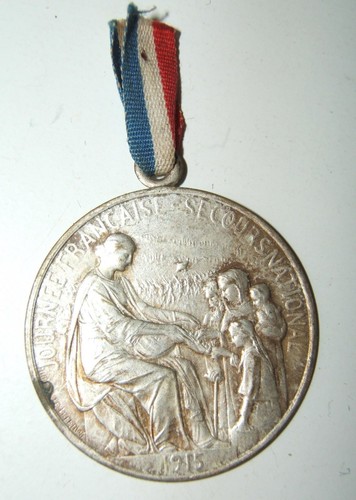 Medaille journee 18 - de,