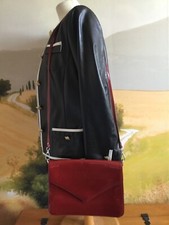 Sac vernis rouge CAROLL en très bon état.