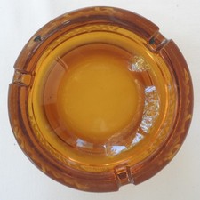 Cendrier rond en verre ambré
