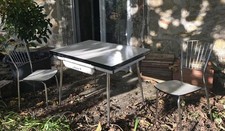 Table en formica avec rallonges et 6 chaises ,année 60