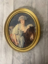 Cadre ovale représentant 1 femme ,cheval ,cadre dorée à la feuille atelier d’art