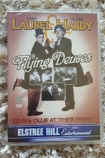 Laurel hardy in flying - in,
