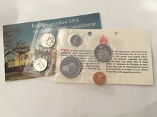 Monnaie royale canadienne 1974 - Monnaies en plastique scellé - dépliant et enveloppe