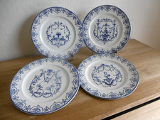QUATRE ASSIETTES PLATES