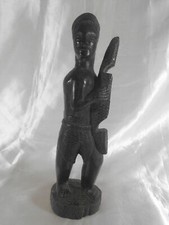 ART AFRICAIN : SCULPTURE / STATUE HOMME A LA PIROGUE EN BOIS ÉBÈNE MADAGASCAR ?