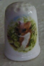 Dé à coudre de collection en porcelaine décoré d'une belette