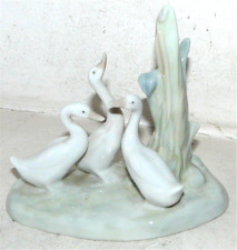 3 OIES GROUPE EN PORCELAINE