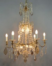 Grand lustre de style louis XVI en cristal et bronze doré