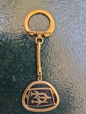porte clés Avion Aviation doré à l'OR Fin compagnie Aérienne Émaillée ?