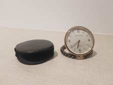 VAN CLEEF & ARPELS DOMINO MONTRE POCHE OU SAC EN CUIR . ETUI EN CUIR.FONTIONNE .