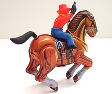 JOUET MÉCANIQUE ANCIEN COWBOY