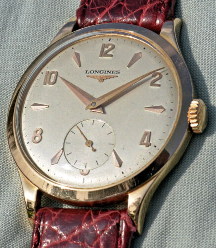 Montre longines 18kt rare - or,