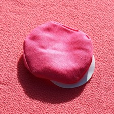 Casquette rose pour poupée