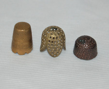 Curiosité , dé à coudre