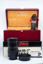 Objectif ZOOM ANGENIEUX 35-70mm f/2,5-3,3 MINOILTA MD + FILTRE/BOITE/PARE-SOLEIL