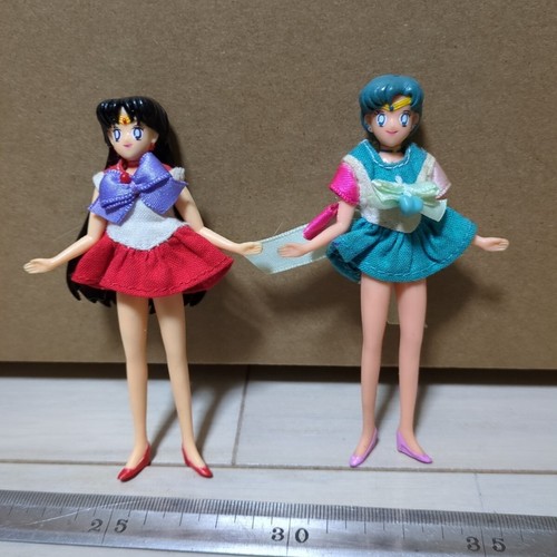 Lot mini poupées - de,
