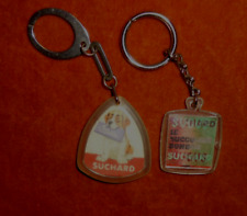 Porte-clés Lot x 2 : 1 visiomatic SUCHARD SUGUS + LE chien ST BERNARD