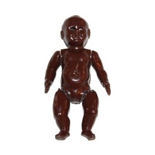 Ancien mini baigneur 8 cm noir yeux dormants poupée folklorique norvégienne ?