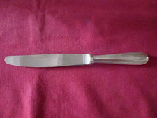 1 couteau à entremet en métal argenté Christofle  modèle perles TBE 12 dispo