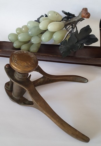 Ancienne capsuleuse bronze - en,
