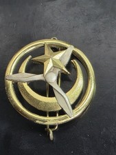 Coiffure . Insigne de Béret -