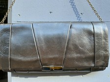 Tres joli sac cuir argent