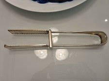 Pince à Asperge  CHRISTOFLE en métal argenté. Très bel état Longueur 25cm