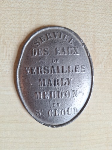 Médaille plomb service - en,