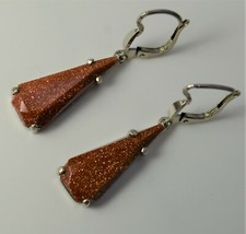 Boucles d'oreilles en argent et pierres de soleil poincon crabe