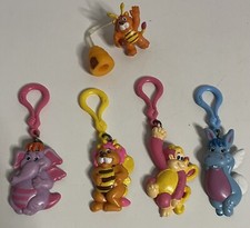 Wuzzles - 4 Keyring Figures - 4 Porte clés - 1 mini figurine Bumblelion Disney